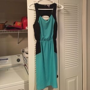 Dress size small, light weight. Teal & black.